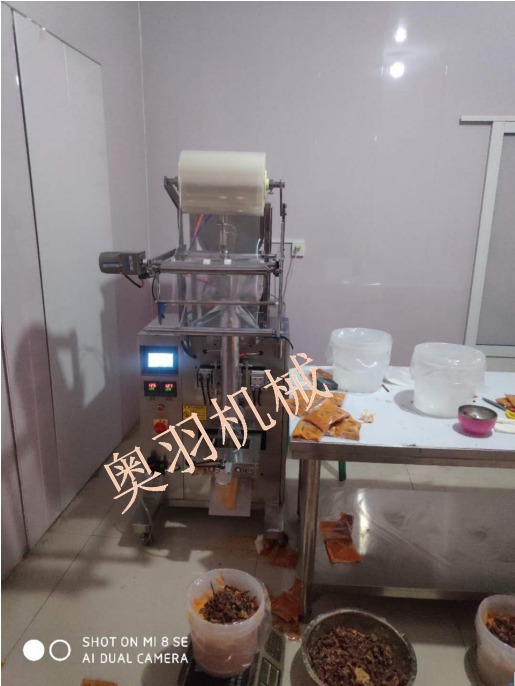 安徽板面底料包裝機  辣椒+牛油固定比例自動包裝_http://m.readbangkokpost.com_立式包裝機系列_第1張